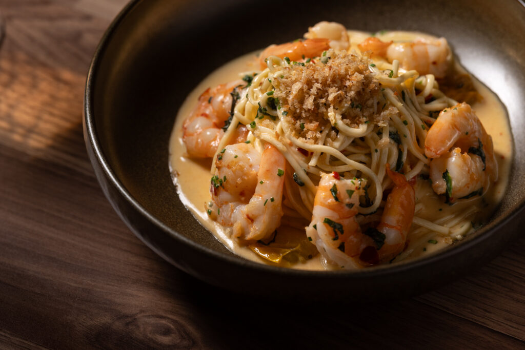 Sautéed jumbo shrimp with housemade spaghetti, tomatoes and lemon cream sauce at Katerina Restaurant